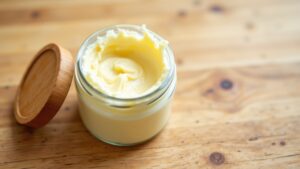 Glass jar with beef tallow | Franklin Dermatology